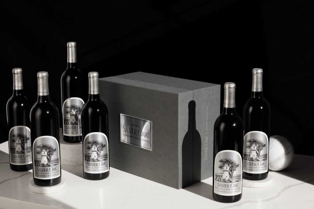 Silver Oak Library Selection of Alexander Valley cabernet vintages arranged around the grey collector's box