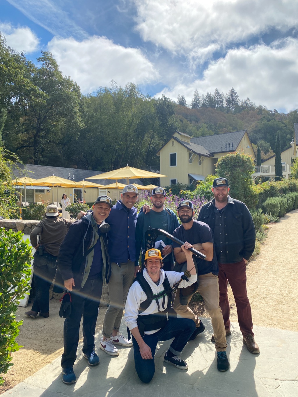 Production crew group portrait in the gardens of a wine country resort