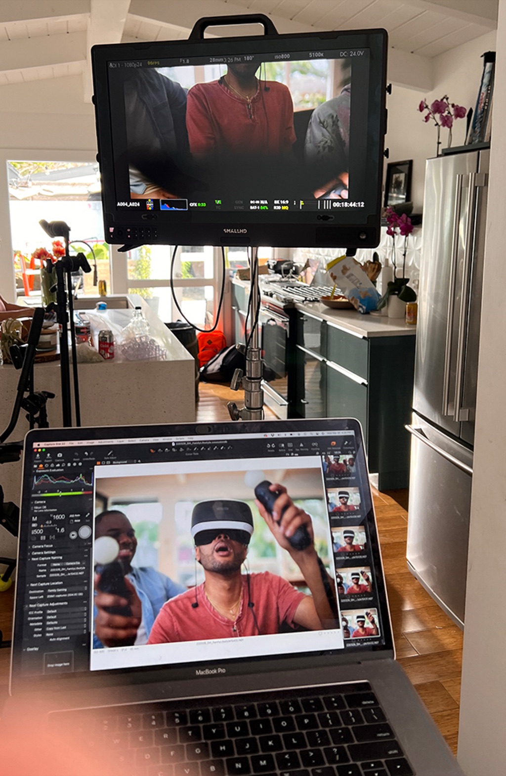Tether station monitors showing virtual reality gaming footage during a commercial shoot