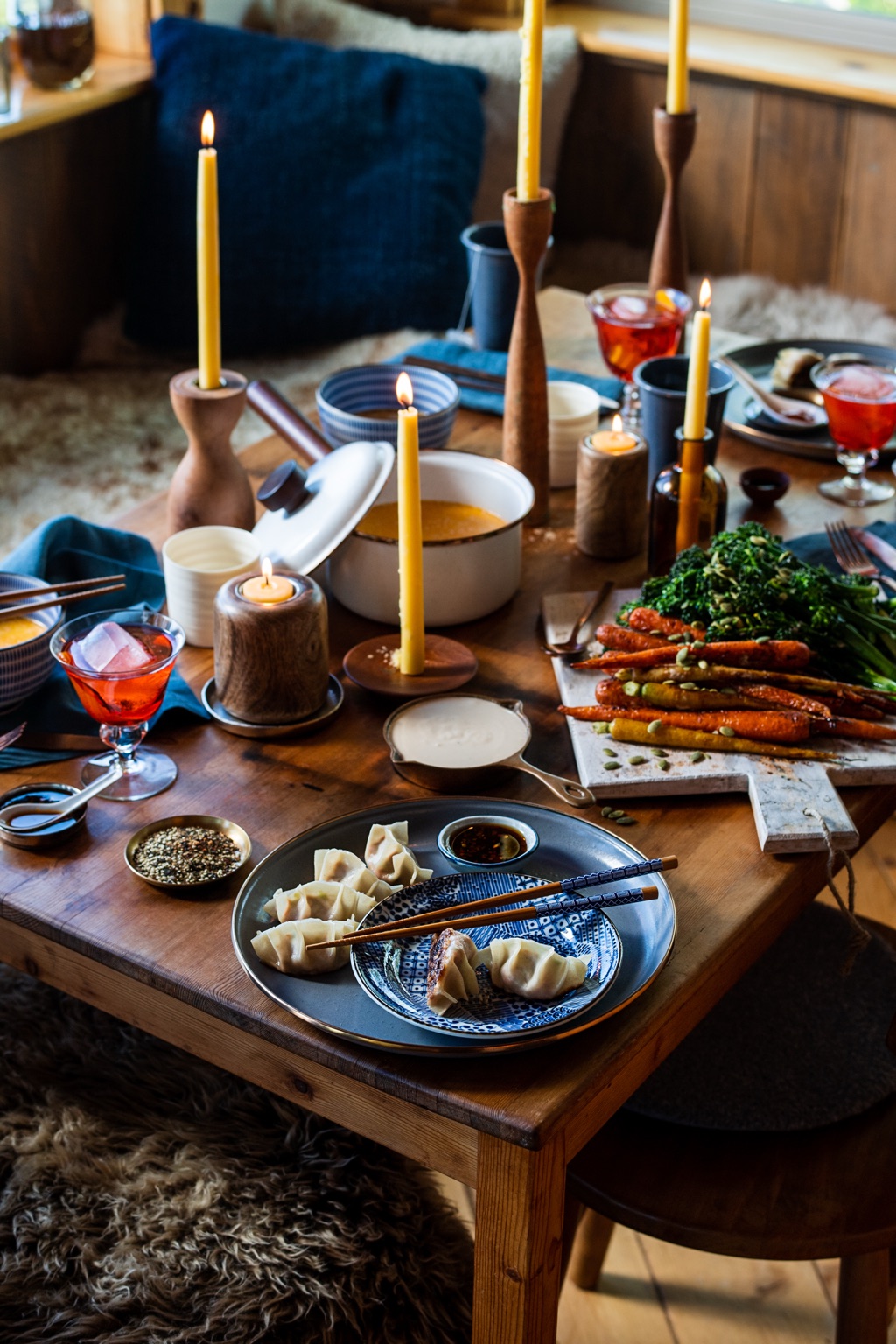 Candlelit dumpling dinner with negronis, roasted rainbow carrots and beeswax tapers