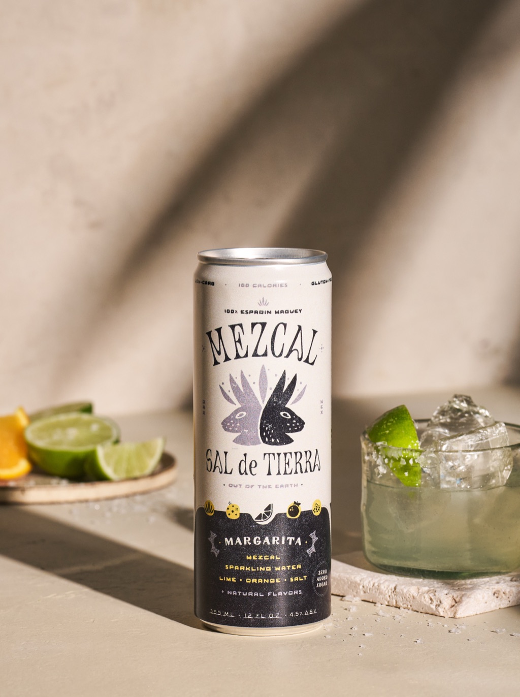 Sal de Tierra mezcal margarita can with a salted rocks pour in raking light
