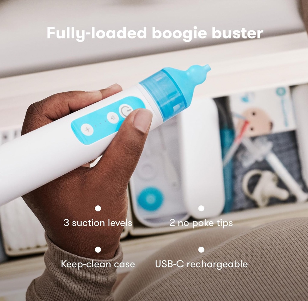 Frida Baby electric NoseFrida aspirator digital ad photographed in hand