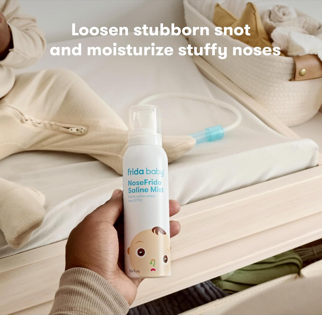 Frida Baby NoseFrida saline mist digital ad held beside a changing table