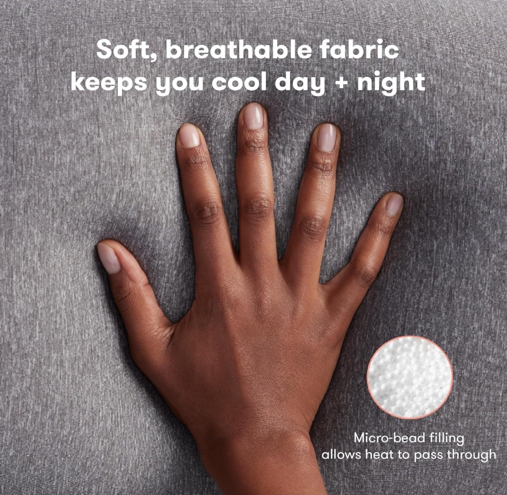 Frida Mom pregnancy pillow digital ad showing the breathable fabric in a hand detail