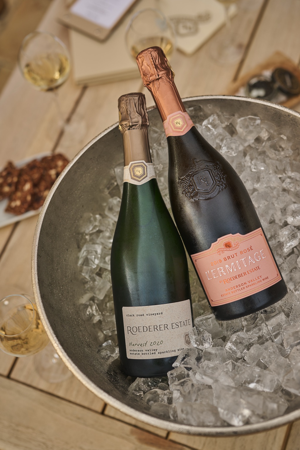 Roederer Estate Harvest 2020 and L'Ermitage Brut Rose bottles chilling in a bucket of ice, Anderson Valley sparkling wine photography