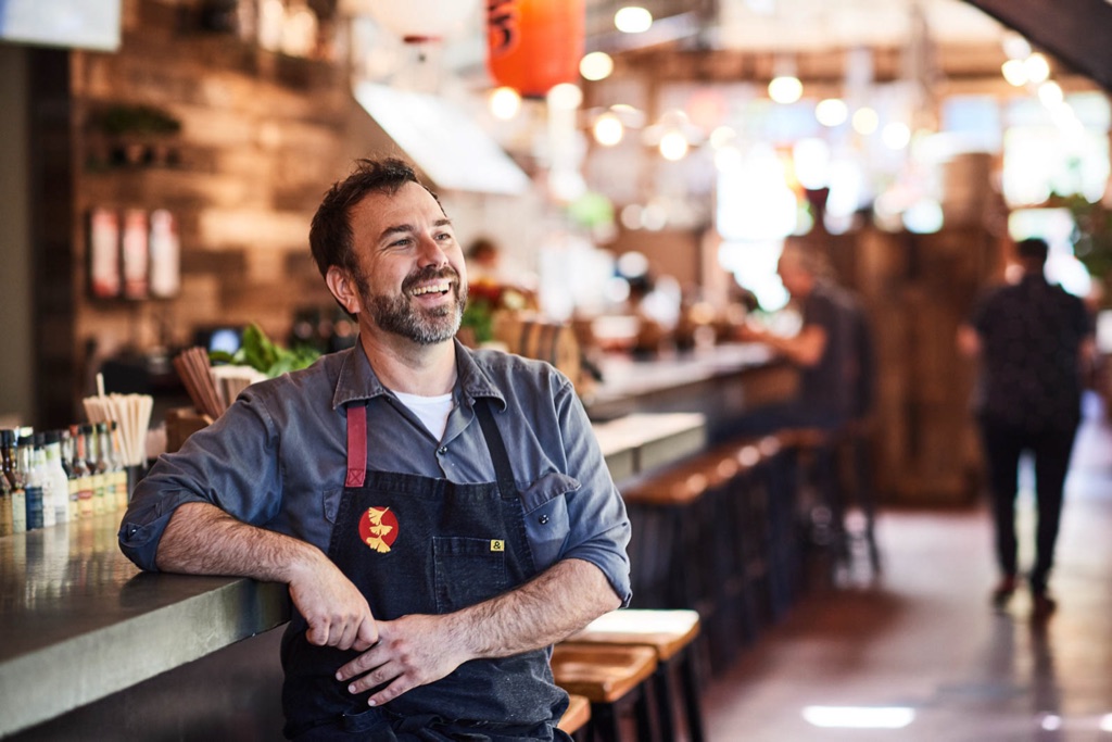 Chef portrait at the bar of an izakaya restaurant