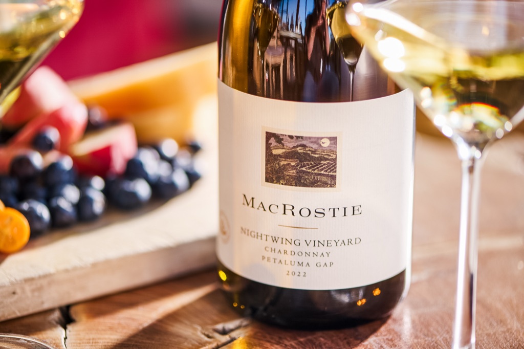 MacRostie Nightwing Vineyard chardonnay close-up beside a fruit and cheese board