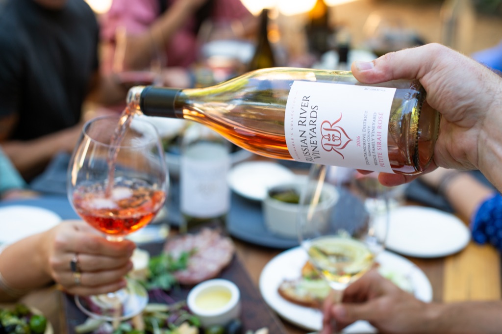 Russian River Vineyards petite sirah rosé poured at a gathered charcuterie table