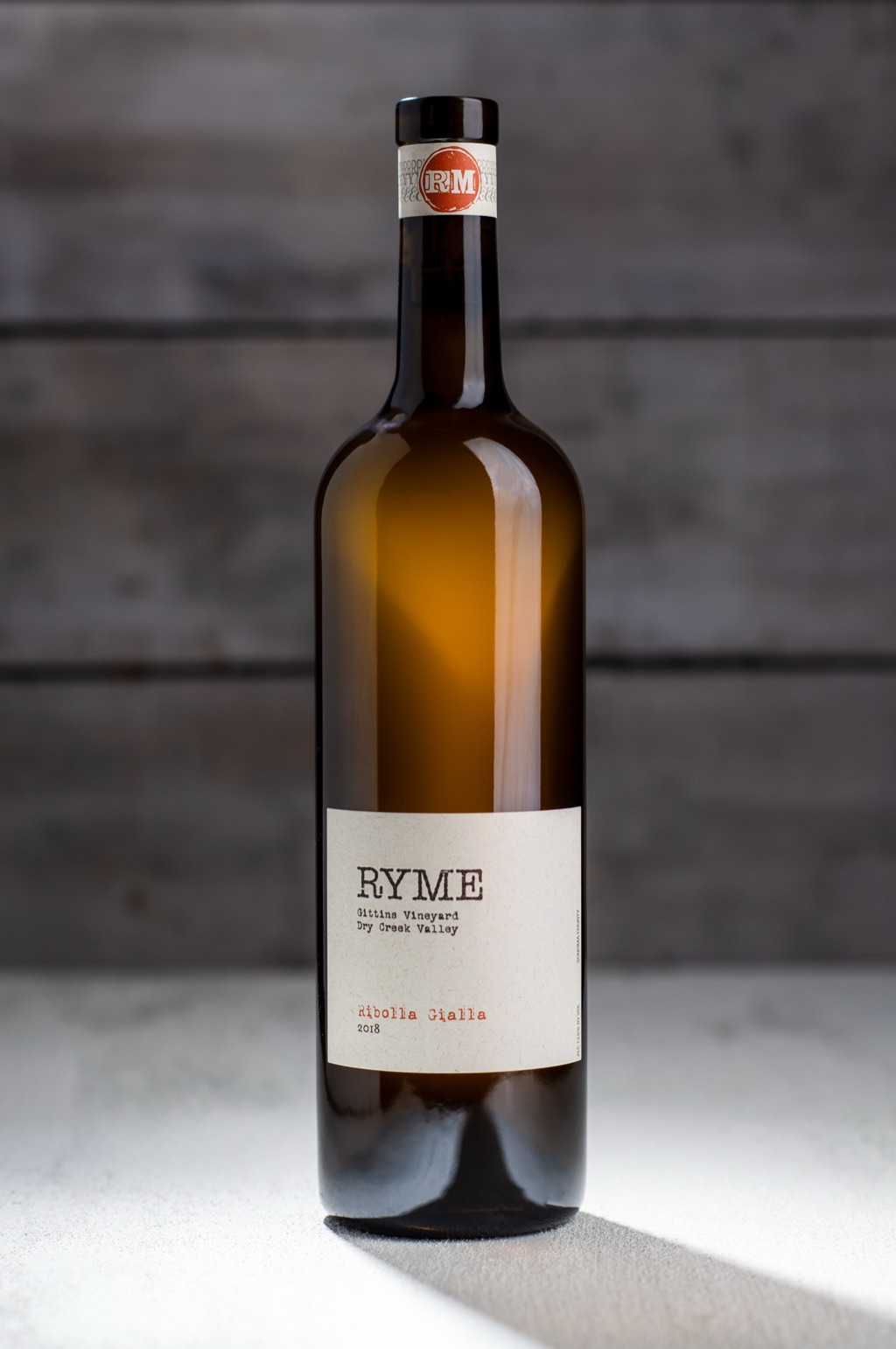 Ryme Cellars ribolla gialla from Gittins Vineyard in a shaft of hard window light